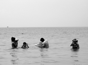 Family doing their thing in the water (while I bum on the sand) - Kampong Som