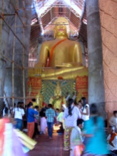 The legendary giant golden Buddha inside the Arthaross Temple, non-traditionally facing the east - Phnom Oudong, Kandal